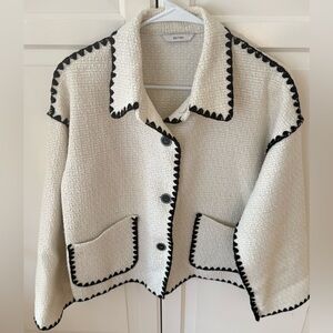 Chic White Jacket with Black Trim